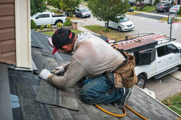 Professional Roofing technician working in Vida, OR